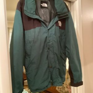 The North Face green ski jacket in Size M.